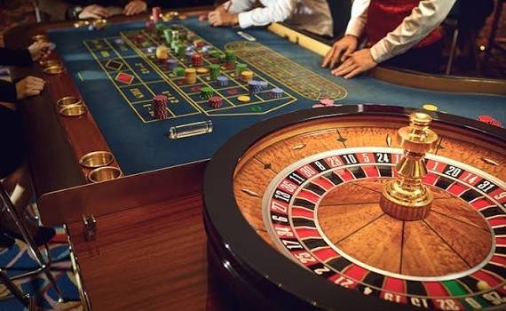 Betbhai9 live casino roulette table with colorful betting layout and casino chips